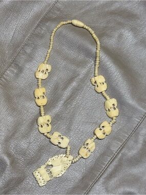 Handcrafted Cream Bone Bead Necklace with Carved Pendants